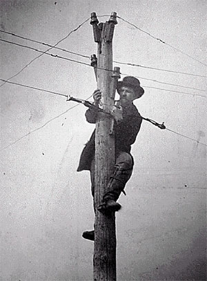 USMT worker stringing wire